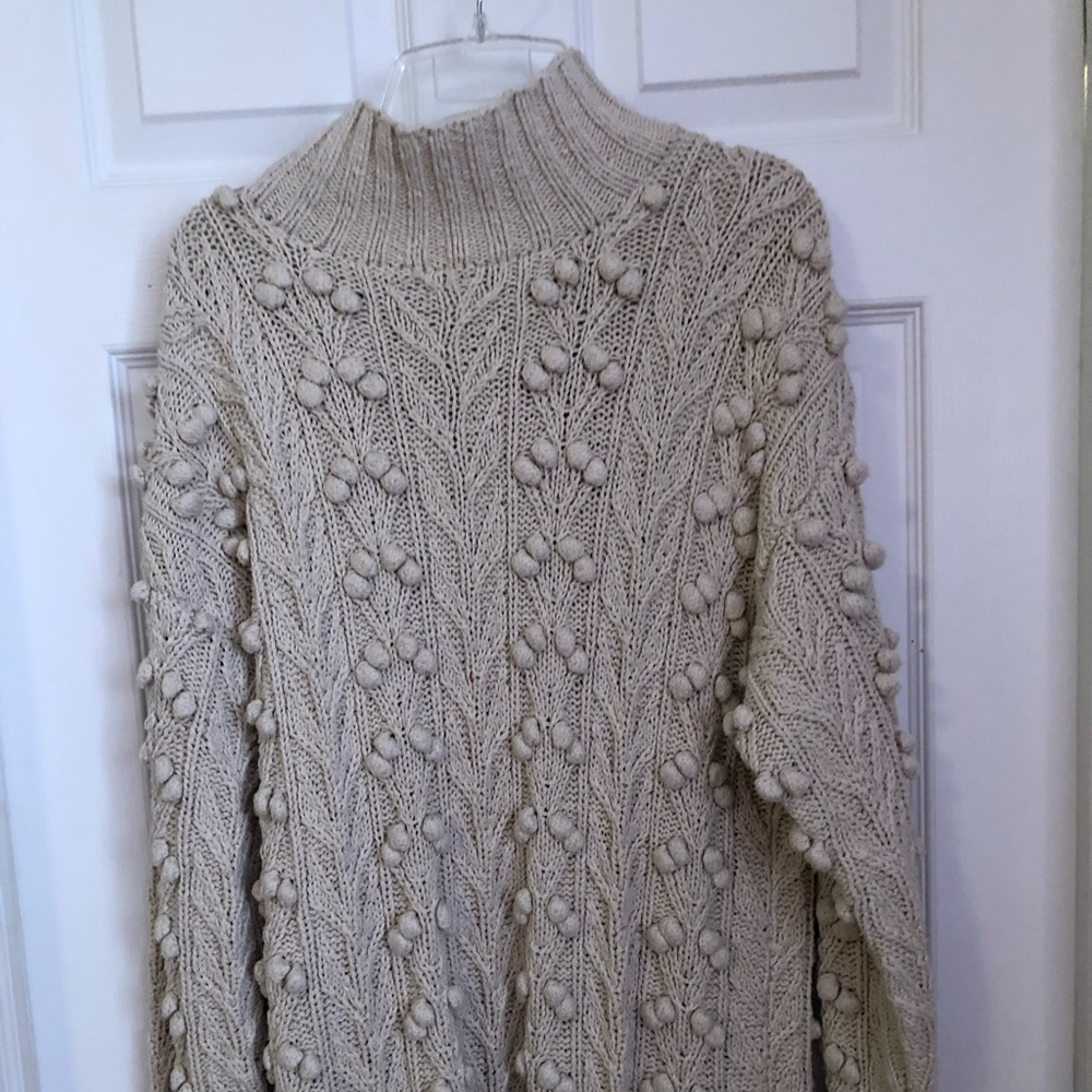 Vintage sweater with pom-poms